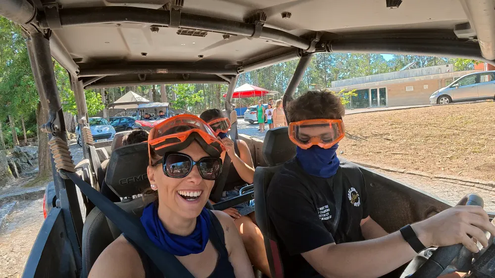 Big grin in sunglasses and goggles