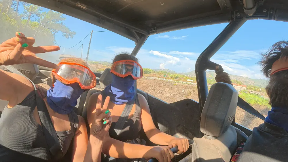 Waving from the back seat